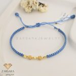 دستبند بافت و طلا گوی