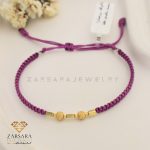 دستبند بافت و طلا گوی