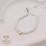 دستبند مرواریدی با پلاک قلب